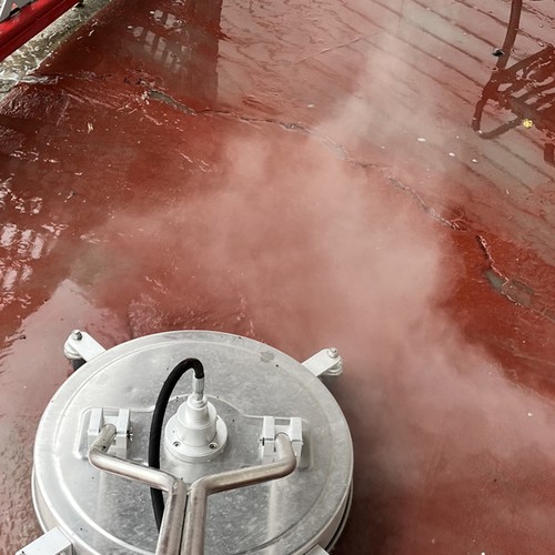 Surface cleaner washing a porch